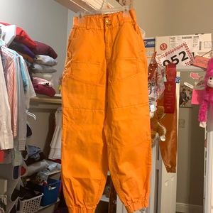 orange urban cargo pants